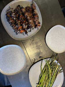 Homemade steak kebab and asparagus dinner.